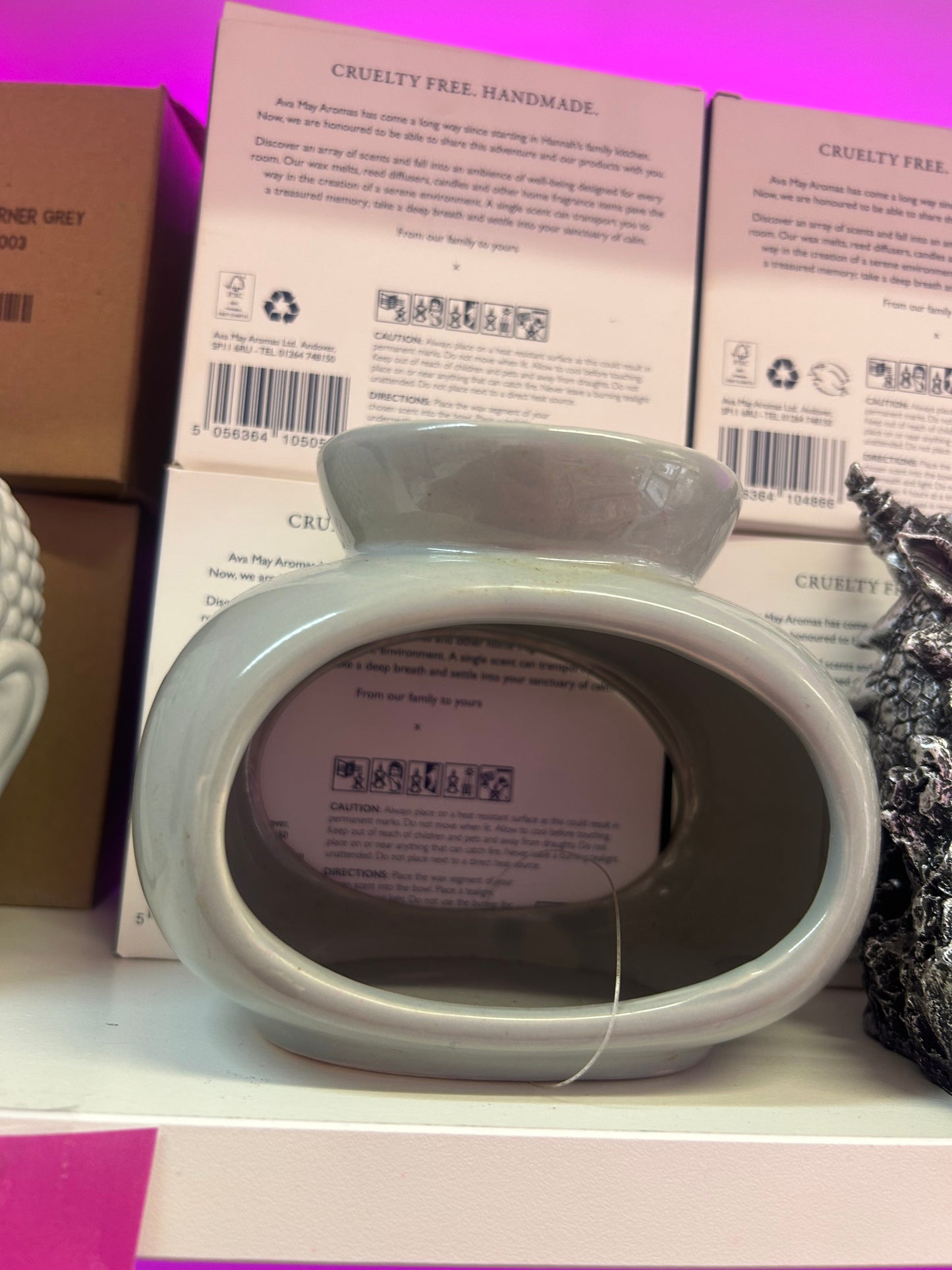 Grey oval tealight burner with a free wax tub